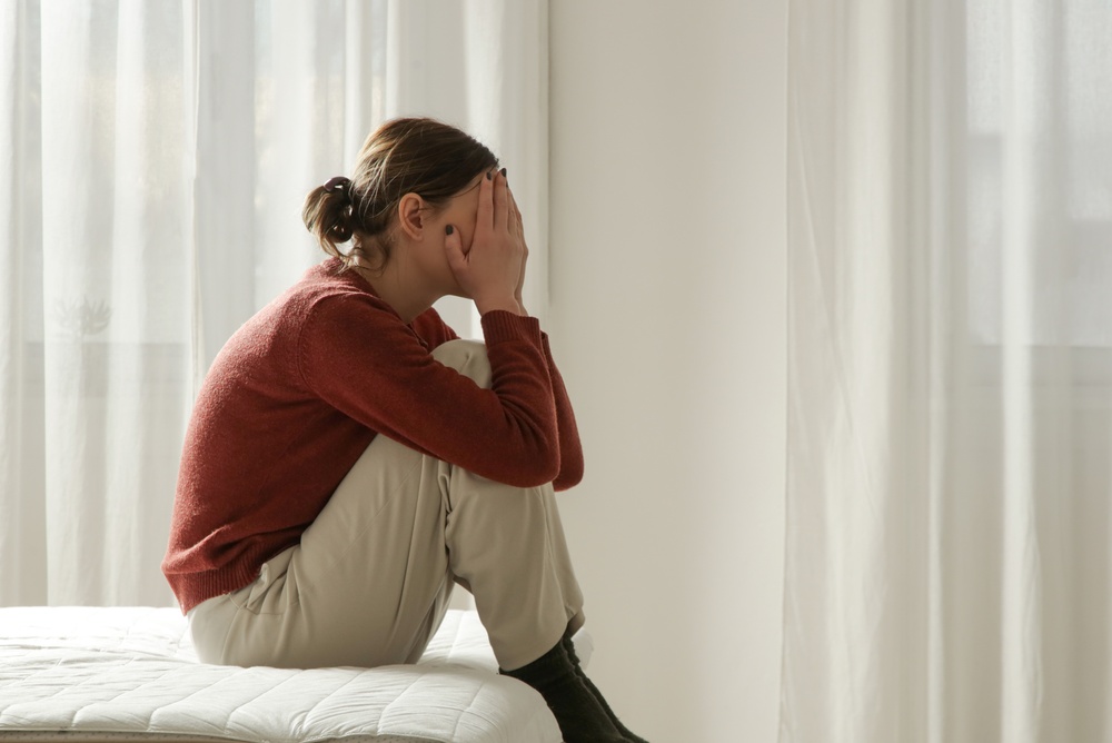 A woman sad about her father